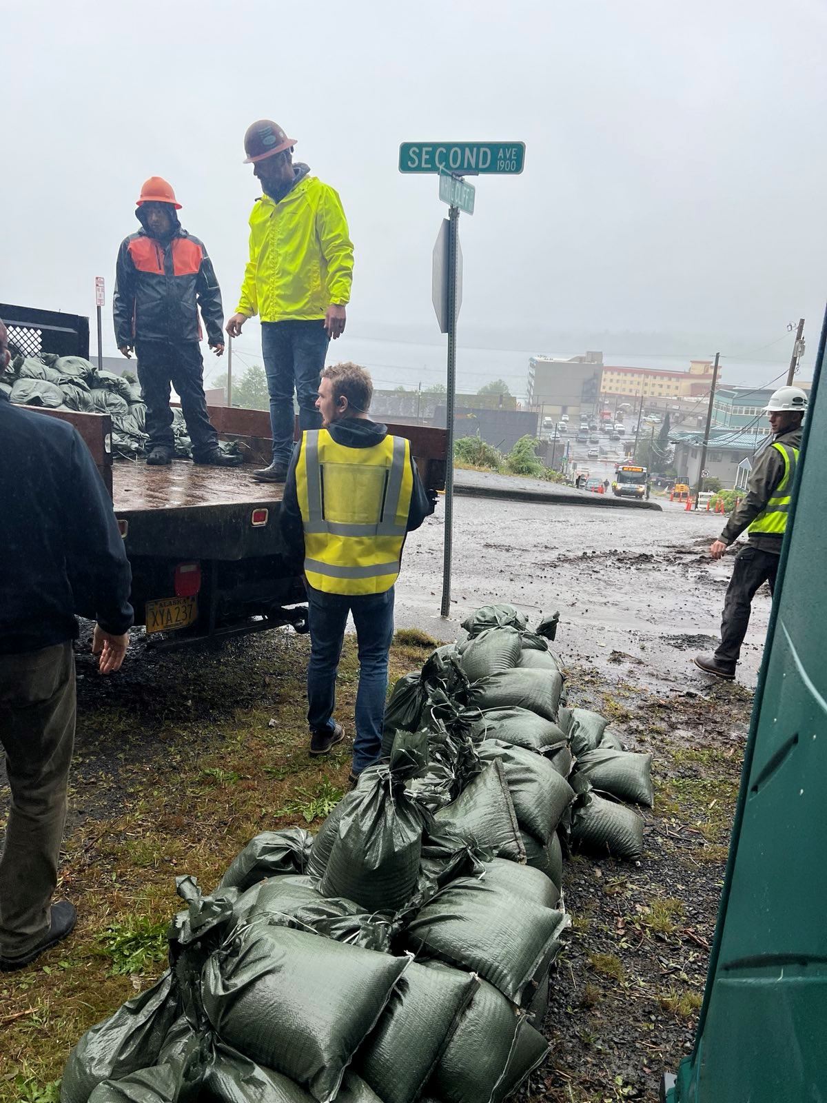 Sandbagging to divert the flow of water